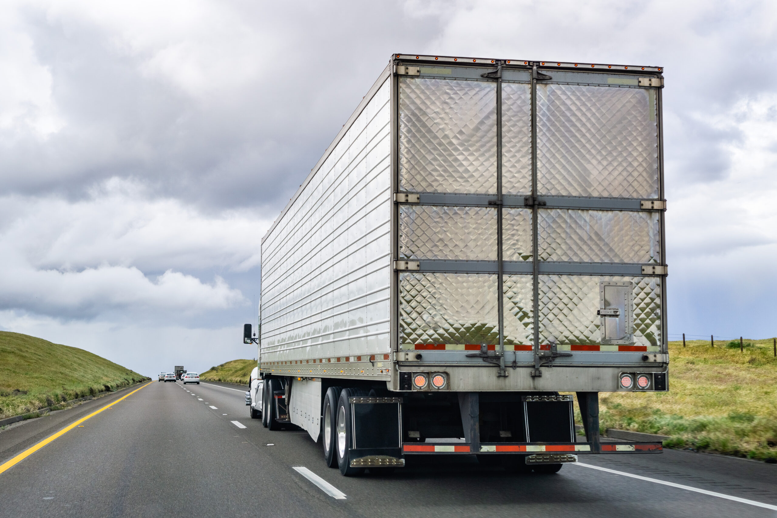 Semi-truck on highway, serviced by heavy duty wrecker Houston TX.